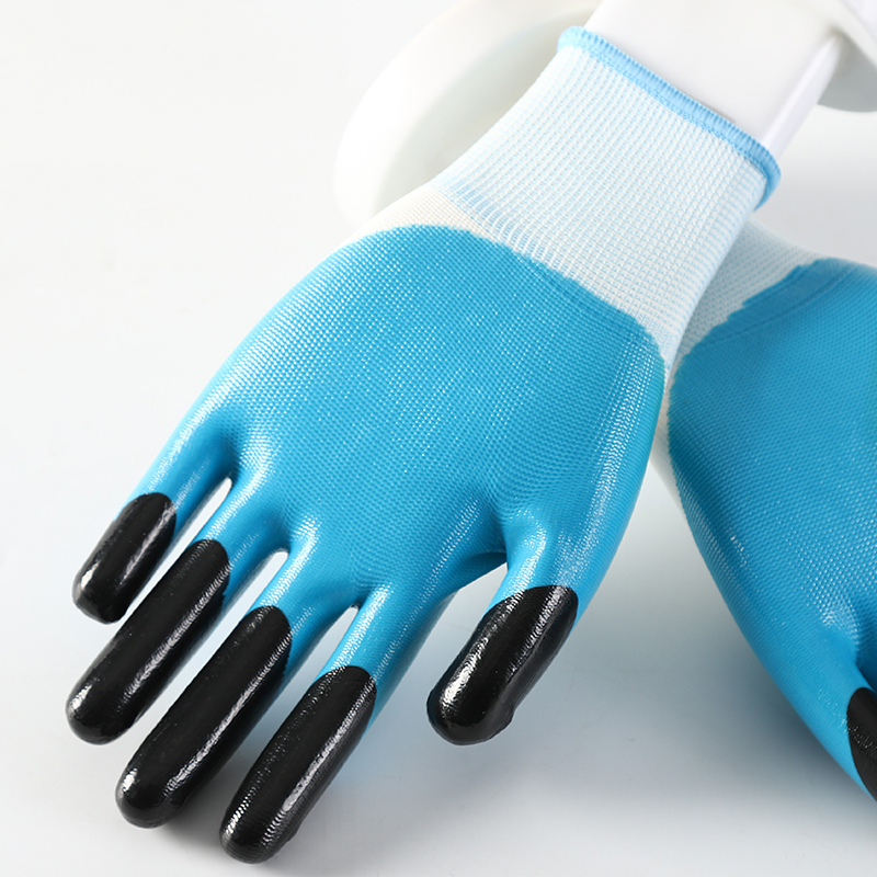 White polyester with orange nitrile Half Coated Gloves