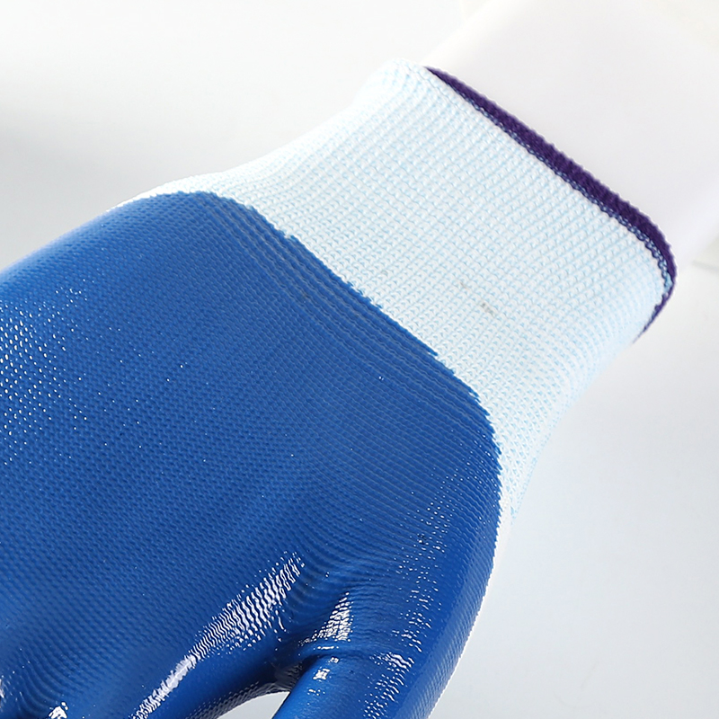 White polyester with blue nitrile coating gloves
