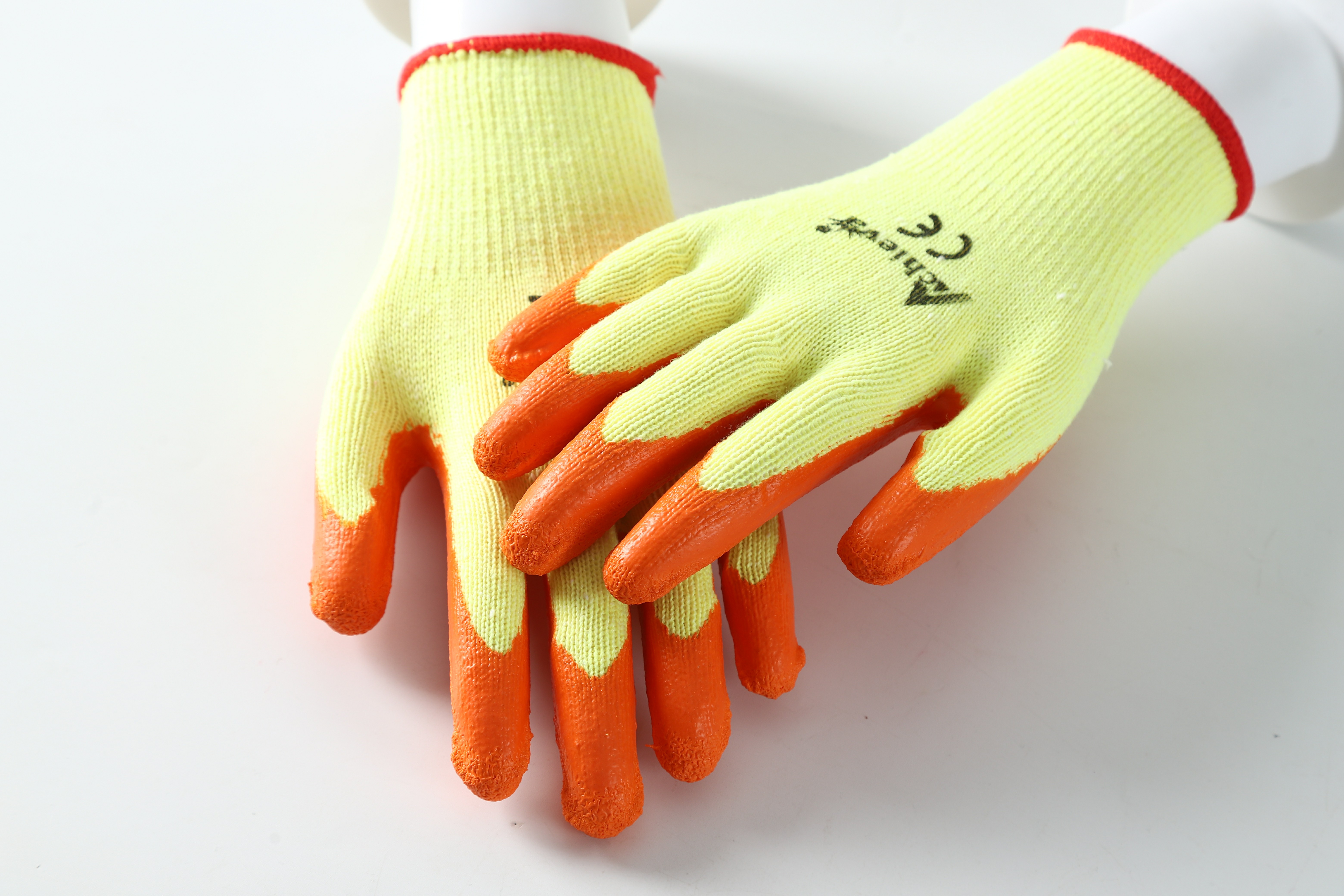 Yellow Polycotton yarn with orange latex crinkle coating gloves